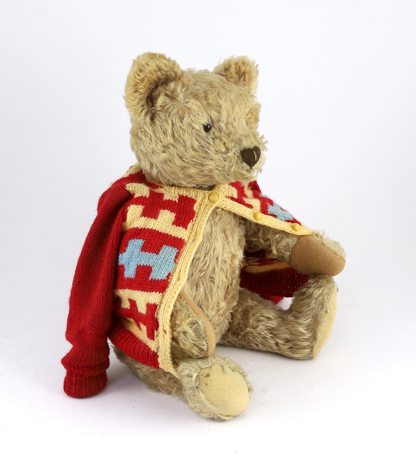 A large Steiff blonde mohair teddy bear, circa 1920, height 48cm
